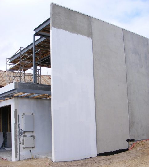 1200px-Precast_concrete_house_in_construction